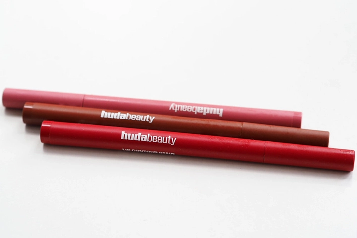 huda beauty lip contour stain in three color red, brown and pinky red
it is the new trend product from huda beauty lines on oillis review product article