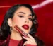 huda beauty lip contour stain Huda Kattan is promoting her new lip contour with red background and new trend makeup on her face